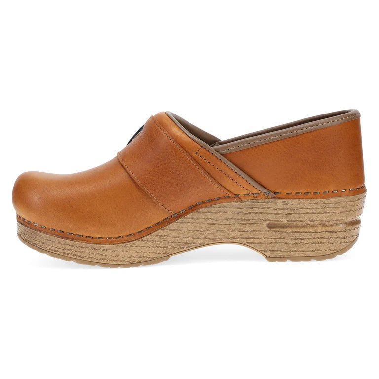 Dansko clogs tan sales